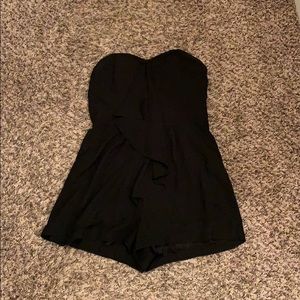 Cute black romper from express size 4